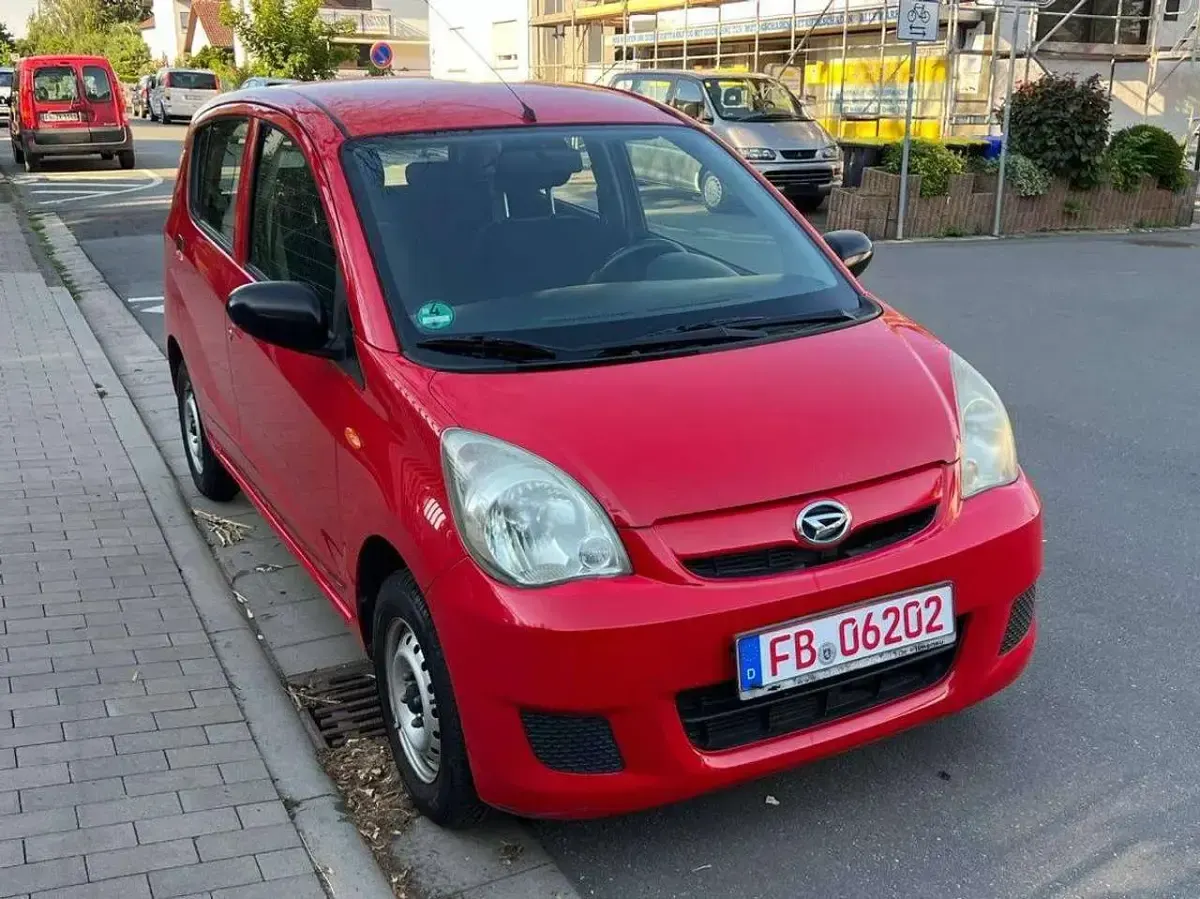 Gebraucht Daihatsu Cuore Plus 58 PS (42 kW) 2008 Rot Kleinwagen