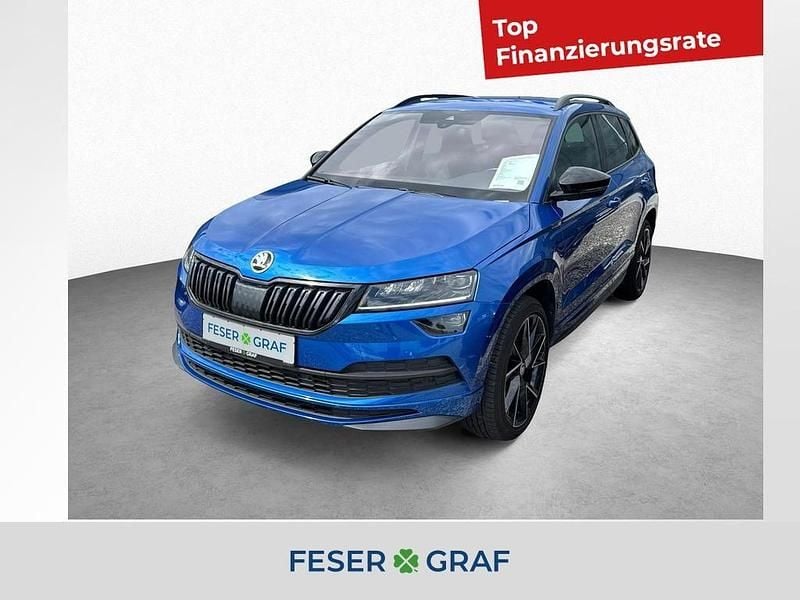 Raceblau metallic Gebraucht 2020 Skoda Karoq SportLine SUV | 28.960 € (Etwas zu teuer) - Bild 1/4
