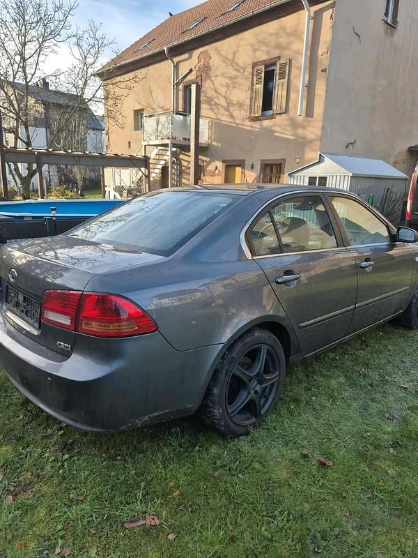 Grau Gebraucht 2008 Kia Magentis Limousine | 2.700 € - Bild 1/4