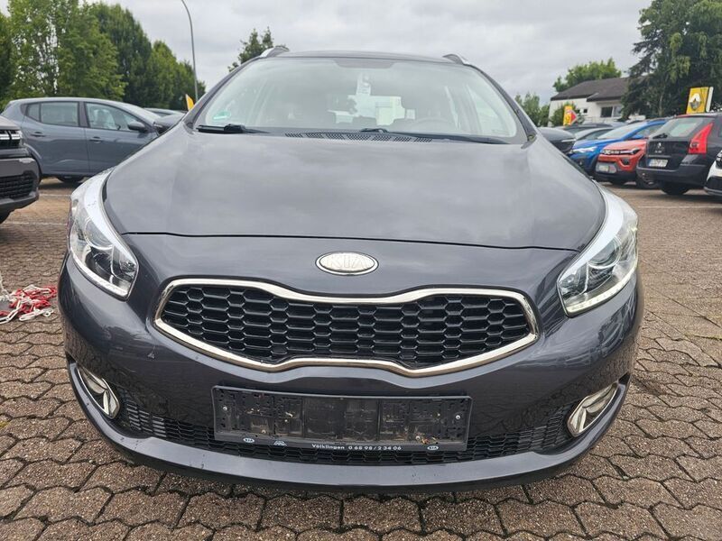 Grau Gebraucht 2013 Kia Ceed Sportswagon Vision Kombi | 5.700 € (Guter Preis) - Bild 1/4
