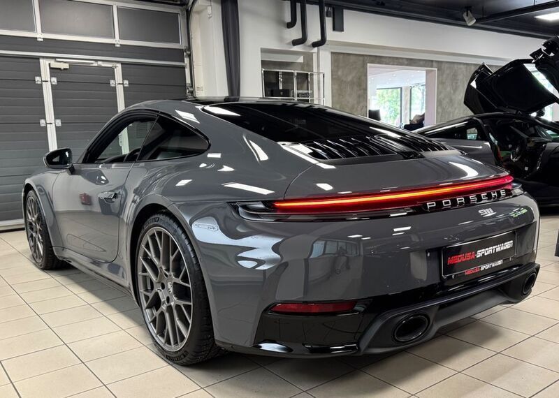 Grau Gebraucht 2024 Porsche 911 Carrera Coupé | 149.800 € - Bild 1/4
