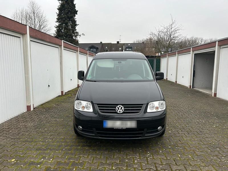 Gebraucht VW Caddy Team 105 PS (77 kW) 2010 Schwarz Van / Kleinbus