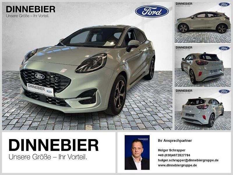 Grau (metallic) Gebraucht 2024 Ford Puma Gen-E ST-Line X SUV | 25.845 € - Bild 1/4