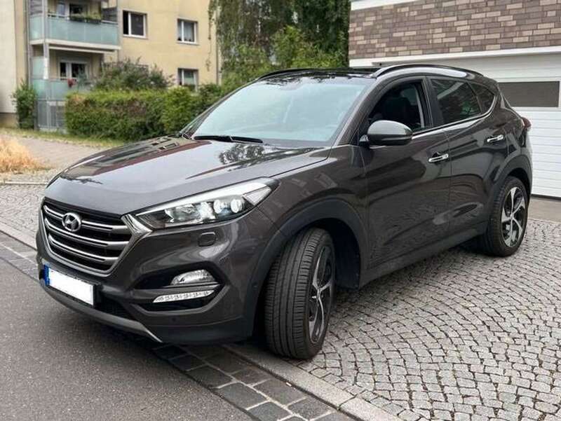 Braun Gebraucht 2016 Hyundai Tucson Premium SUV | 13.500 € (Superpreis) - Bild 1/4
