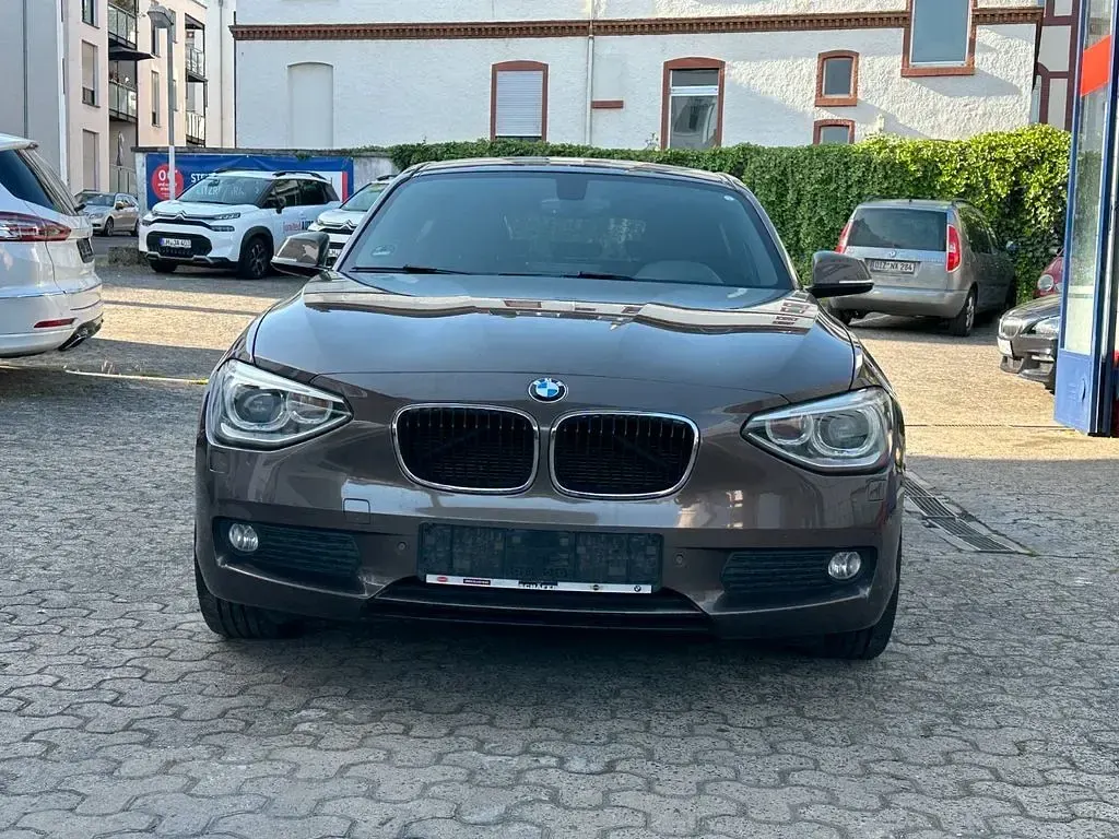 Gebraucht BMW 118 143 PS (105 kW) 2014 Braun Kleinwagen