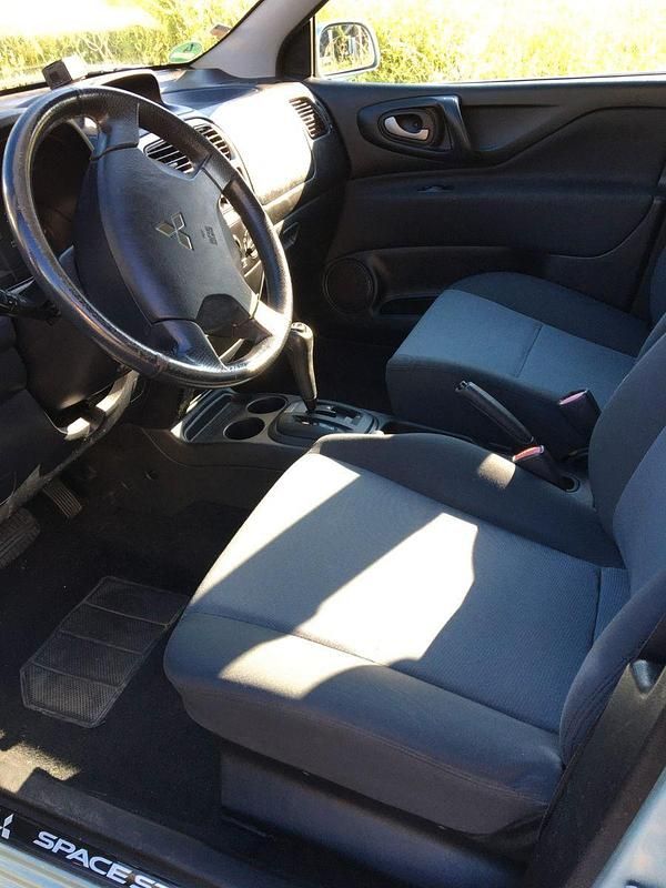 Gebraucht Mitsubishi Space Star 111 PS (81 kW) 2003 Silber Van / Kleinbus