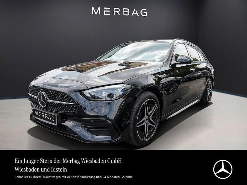 Obsidianschwarz Gebraucht 2024 Mercedes C300e AMG Line Premium Kombi | 48.880 € (Guter Preis) - Bild 1/4