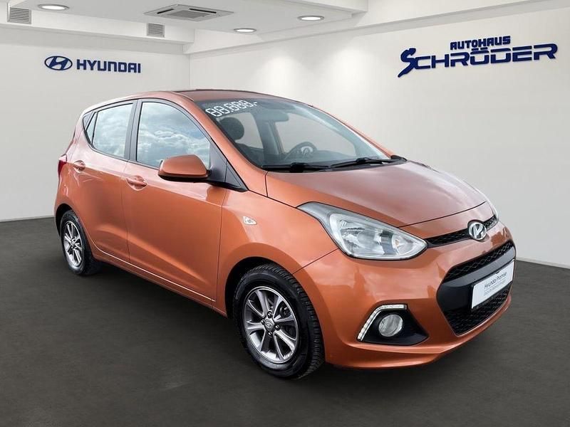 Gebraucht Hyundai i10 67 PS (49 kW) 2014 Orange Kleinwagen