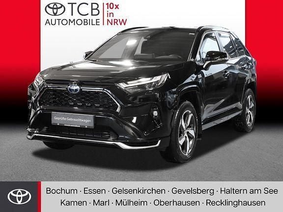 Tiefschwarz mica metallic Gebraucht 2022 Toyota RAV4 Hybrid Plus SUV | 38.989 € (Fairer Preis) - Bild 1/4