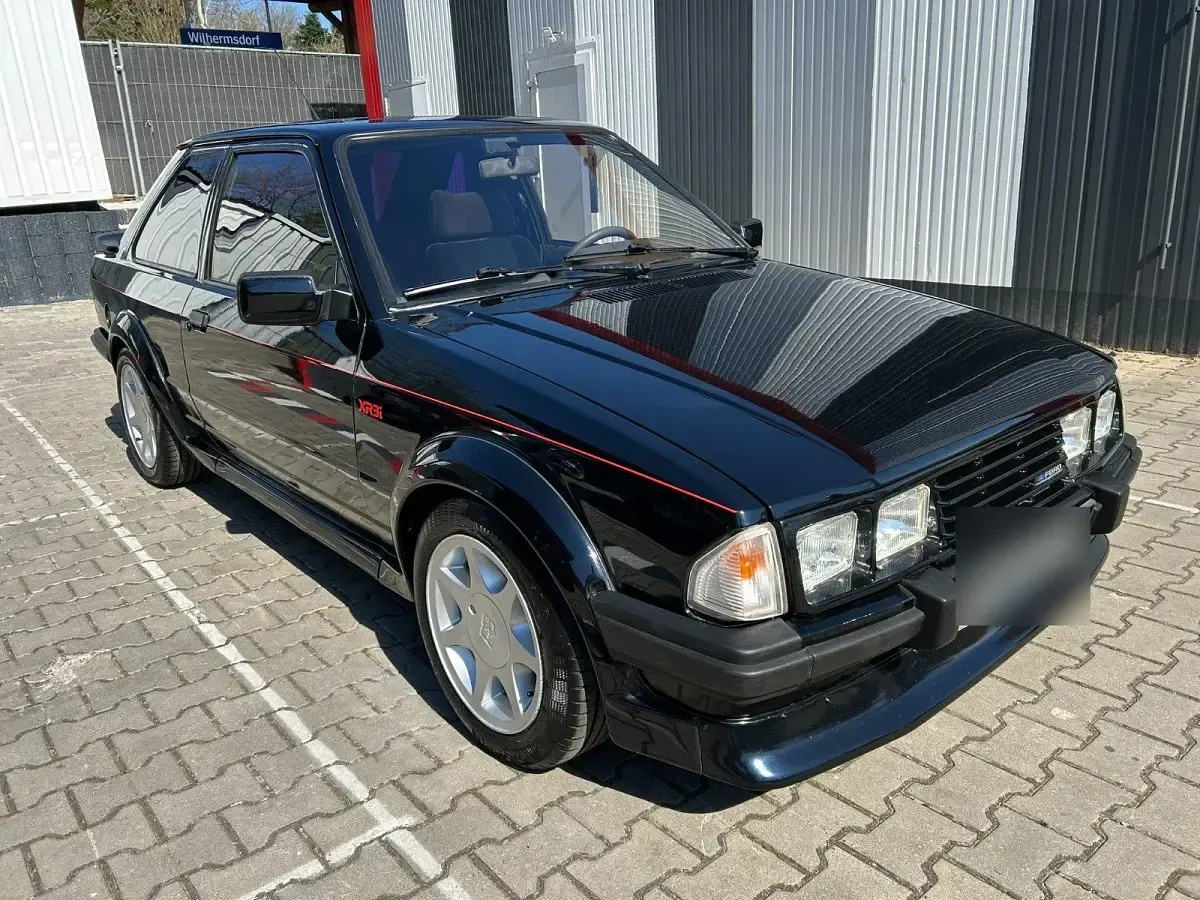 Second-hand Ford Escort 105 CP (77 kW) 1984 Negru Berlinǎ