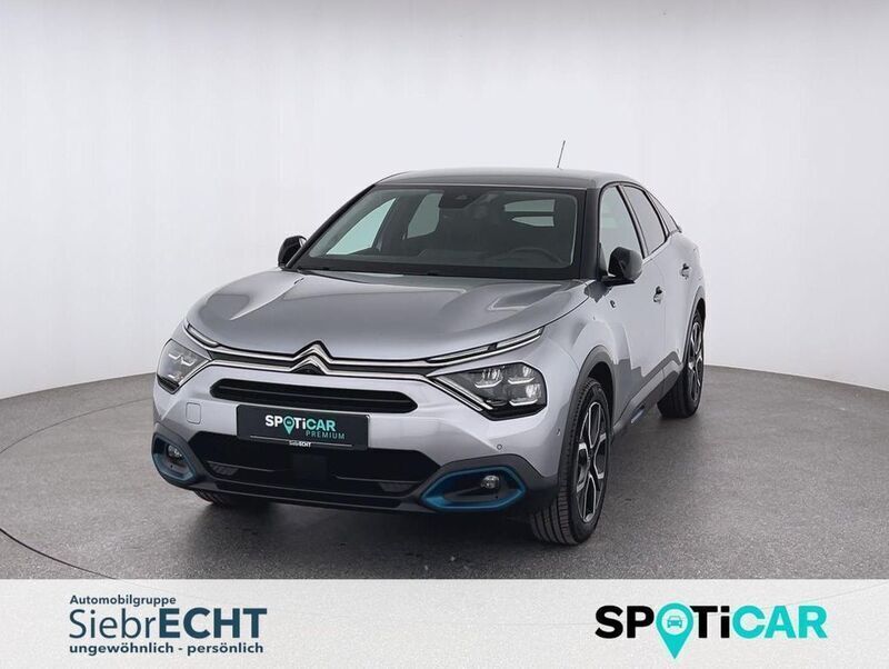 Grau Gebraucht 2022 Citroën e-C4 Shine Limousine | 19.970 € (Fairer Preis) - Bild 1/4