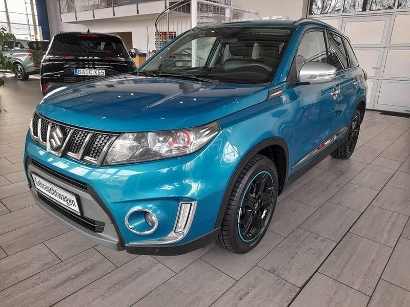 Grün Gebraucht 2017 Suzuki Vitara SUV | 15.480 € (Teuer) - Bild 1/4