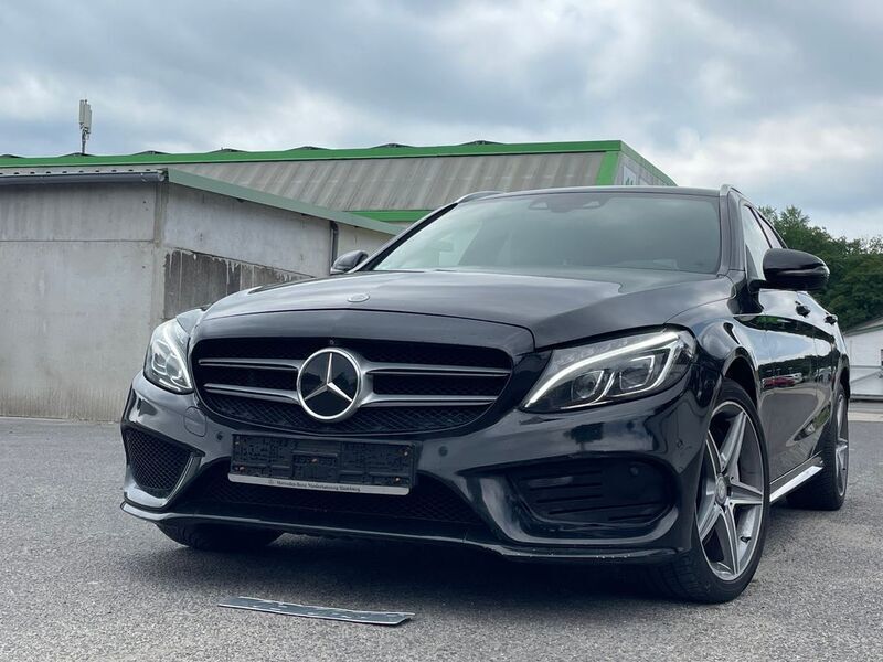 Schwarz Gebraucht 2017 Mercedes C250 AMG line Limousine | 12.999 € (Superpreis) - Bild 1/4