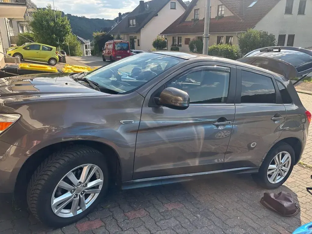 Gebraucht Mitsubishi ASX Invite 150 PS (110 kW) 2014 Braun SUV