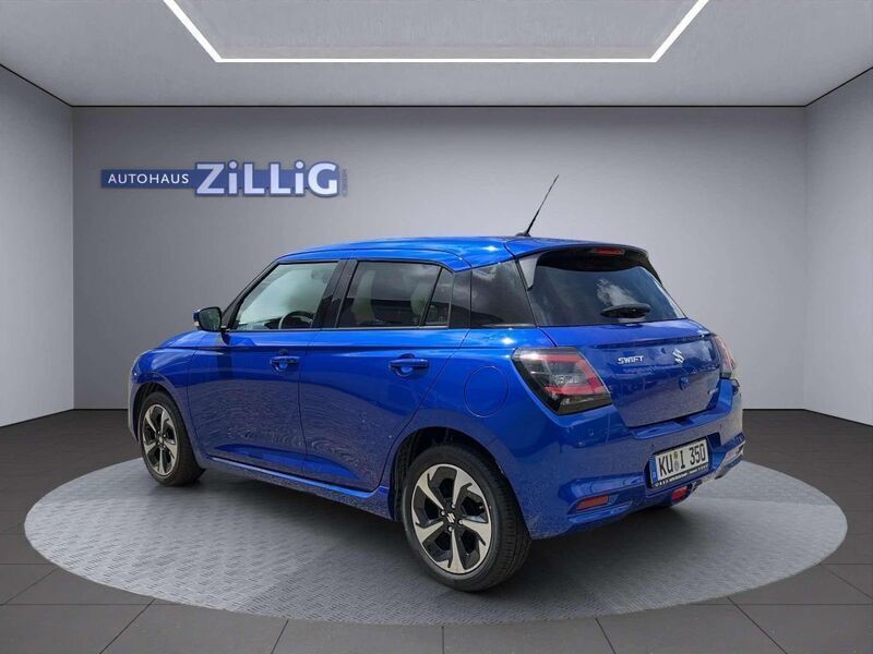Gebraucht Suzuki Swift Comfort+ 83 PS (61 kW) 2024 Frontier blue pearl metallic Kleinwagen