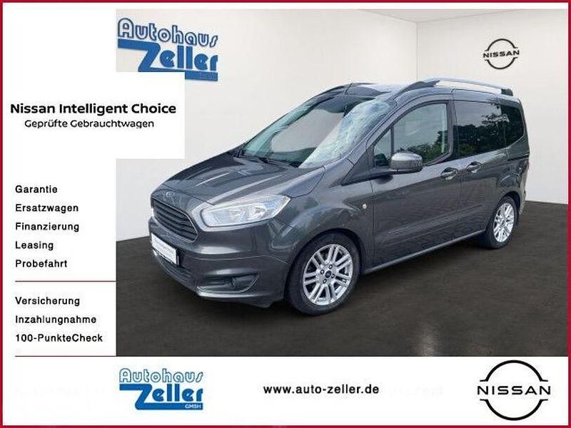 Grau Gebraucht 2016 Ford Tourneo Courier Titanium Van / Kleinbus | 9.990 € (Fairer Preis) - Bild 1/4