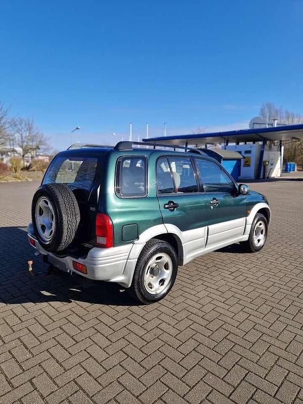 Gebraucht Suzuki Grand Vitara 144 PS (105 kW) 1999 Grün SUV