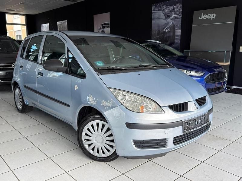 Second-hand Mitsubishi Colt Invite 95 CP (69 kW) 2004 Albastru Hatchback