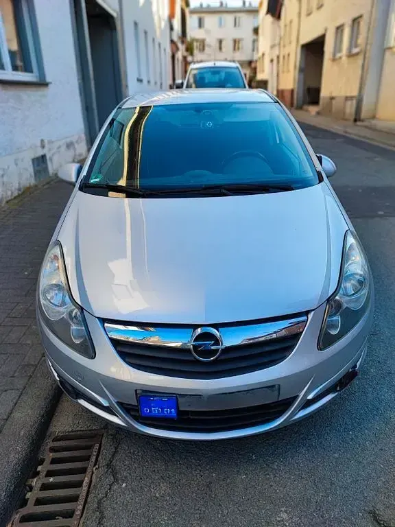 Używany Opel Corsa 95 KM (69 kW) 2010 Srebrny Hatchback