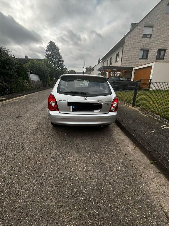 Gebraucht Mazda 323 98 PS (72 kW) 2003 Silber Limousine