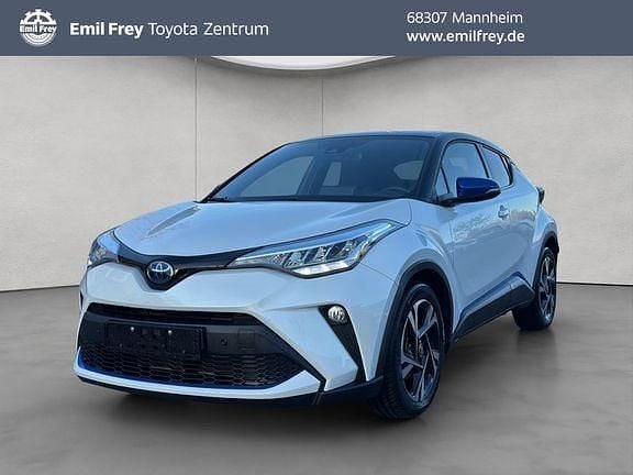 Platinumweiß perleffekt/ dach schwarz Gebraucht 2022 Toyota C-HR Team SUV | 24.490 € (Fairer Preis) - Bild 1/4