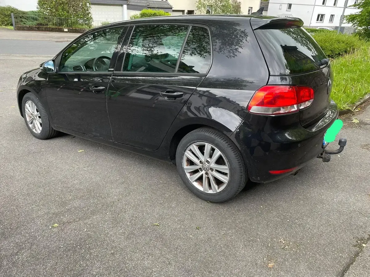 Używany VW Golf Style 105 KM (77 kW) 2012 Czarny Coupe
