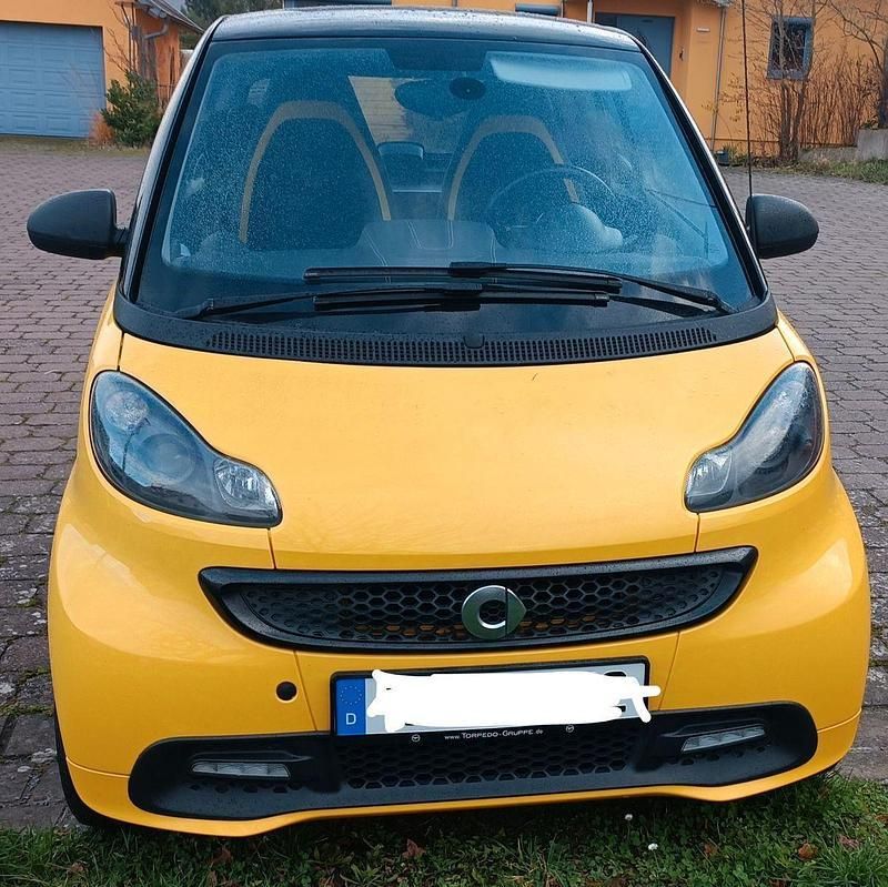 Gelb Gebraucht 2013 Smart ForTwo Coupé Coupé | 7.800 € (Etwas zu teuer) - Bild 1/4