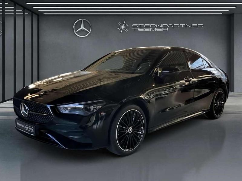 Metalliclack kosmosschwarz Gebraucht 2023 Mercedes E250 AMG Coupé | 35.811 € - Bild 1/3