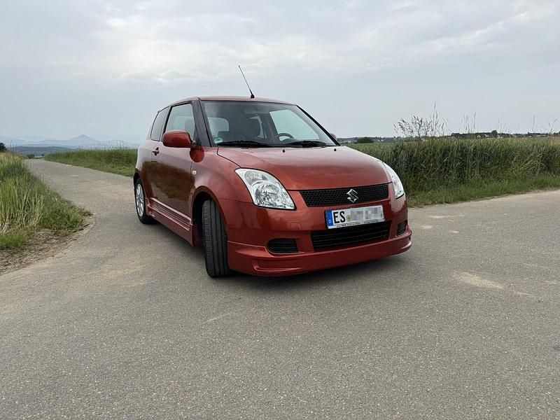 Orange Gebraucht 2007 Suzuki Swift Limousine | 999 € (Superpreis) - Bild 1/4