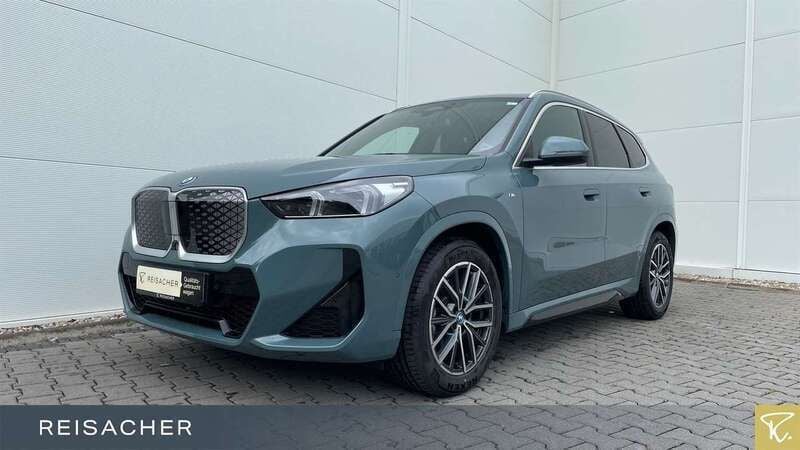 Cape york grün metallic Gebraucht 2024 BMW iX1 Luxury Line SUV | 46.449 € (Fairer Preis) - Bild 1/4