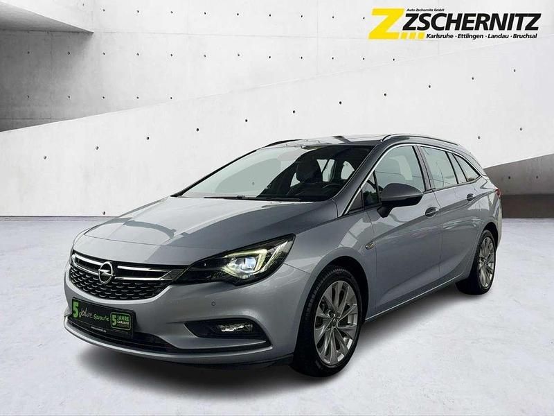 Diamant blau(m2) / diam silb Gebraucht 2016 Opel Astra Innovation Kombi | 8.490 € (Superpreis) - Bild 1/4