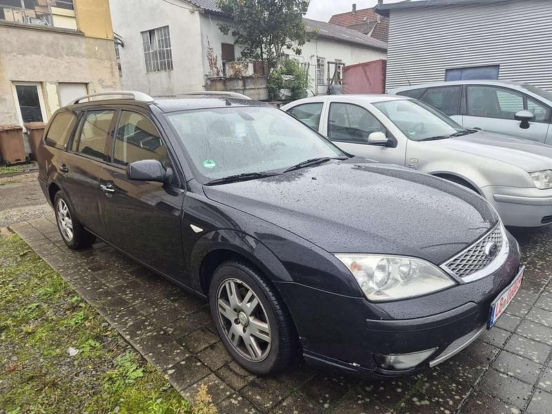 Pantherschwarz metallic Gebraucht 2006 Ford Mondeo Ghia Kombi | 899 € (Superpreis) - Bild 1/4