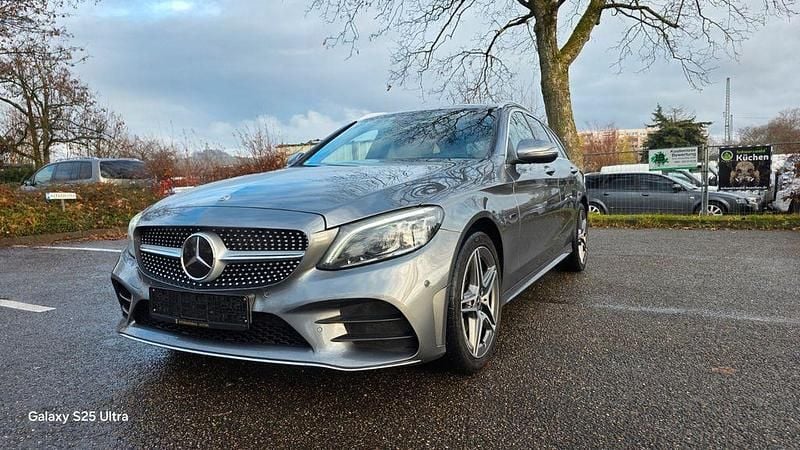 Grau Gebraucht 2020 Mercedes C300e AMG line Kombi | 21.900 € (Guter Preis) - Bild 1/4