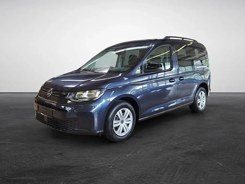 Gebraucht VW Caddy Basis 114 PS (83 kW) 2024 Blau (starlight blue metallic) Van / Kleinbus