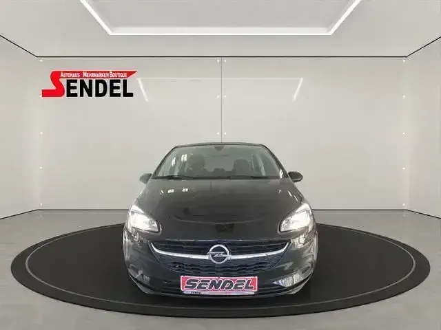Używany Opel Corsa Active 101 KM (74 kW) 2017 Czarny Sedan/Limuzyna