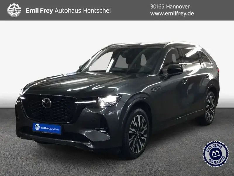 Grau Gebraucht 2024 Mazda CX-80 Homura-Line SUV | 54.993 € (Fairer Preis) - Bild 1/3