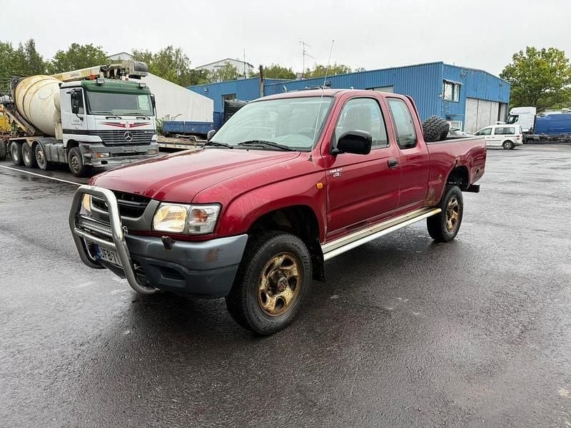 Rot Gebraucht 2003 Toyota HiLux Abholung | 5.750 € (Fairer Preis) - Bild 1/4