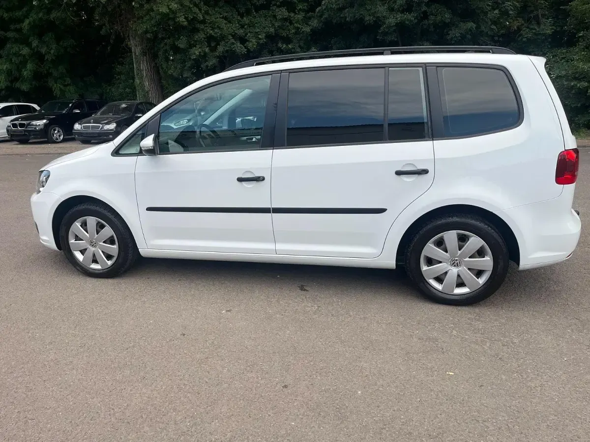 Gebraucht VW Touran Comfortline 140 PS (102 kW) 2014 Weiß Van / Kleinbus