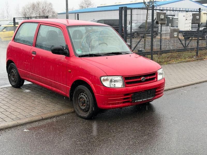 Gebraucht Daihatsu Cuore 56 PS (41 kW) 2000 Rot Kleinwagen
