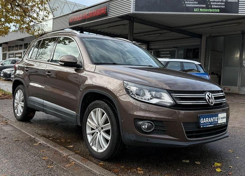 Braun Gebraucht 2014 VW Tiguan Cup SUV | 12.690 € (Fairer Preis) - Bild 1/4
