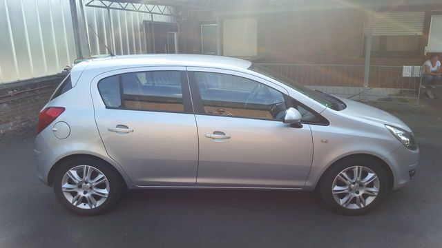 Używany Opel Corsa 118 KM (86 kW) 2010 Srebrny Hatchback