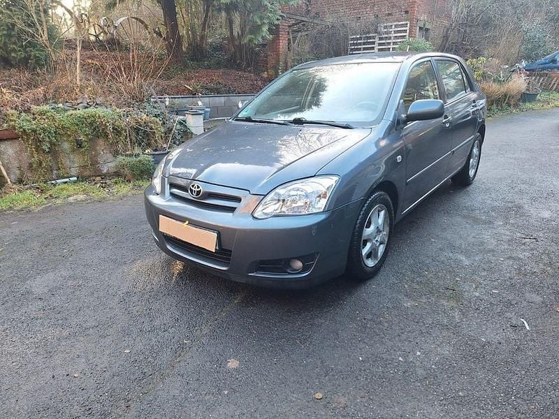 Grau Gebraucht 2006 Toyota Corolla Limousine | 3.850 € (Fairer Preis) - Bild 1/4