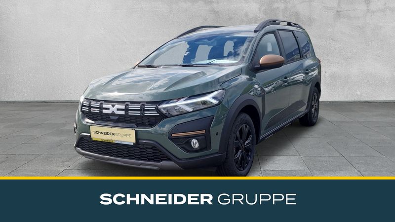 Grün Neu 2024 Dacia Jogger Expression Limousine | 26.490 € (Fairer Preis) - Bild 1/4