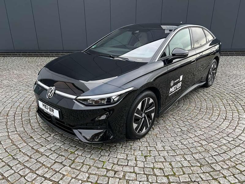 Gebraucht VW ID.7 Pro 210 kW (286 PS) 2023 Grenadillschwarz metallic Kleinwagen
