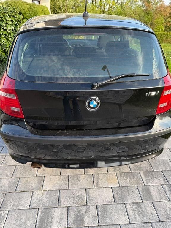 Second-hand BMW 116 122 CP (89 kW) 2009 Negru Hatchback