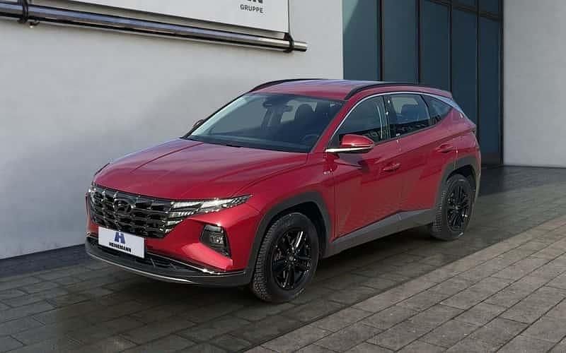 Sunset (metallic) Gebraucht 2021 Hyundai Tucson Select SUV | 23.990 € (Fairer Preis) - Bild 1/4