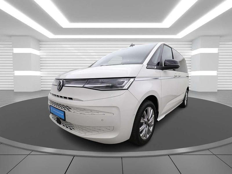 Candyweiß (white), solid Gebraucht 2024 VW T7 Style Van | 55.700 € (Fairer Preis) - Bild 1/4