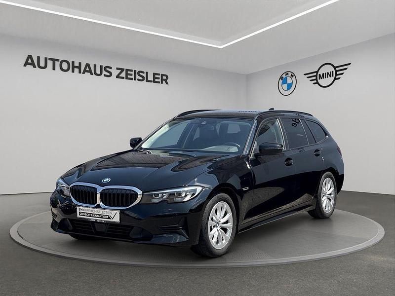 Schwarz ii Gebraucht 2022 BMW 320e Advantage Kombi | 23.680 € (Fairer Preis) - Bild 1/4