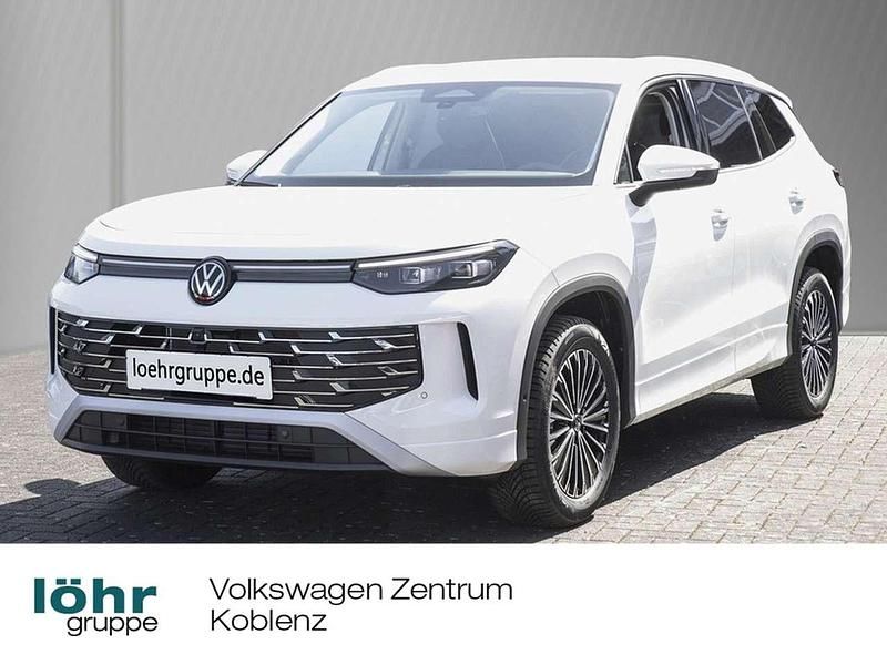 Pure white Neu 2025 VW Tayron Elegance SUV | 56.380 € - Bild 1/4