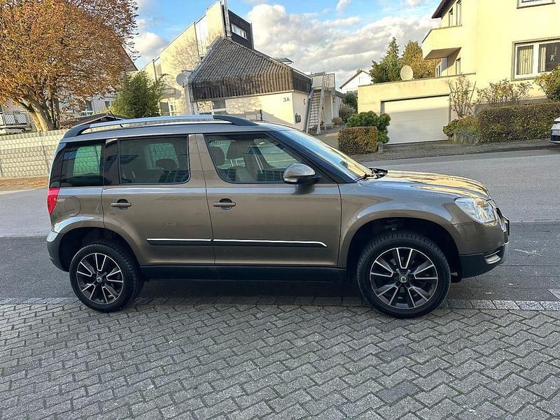 Gebraucht Skoda Yeti 105 PS (77 kW) 2011 Braun SUV